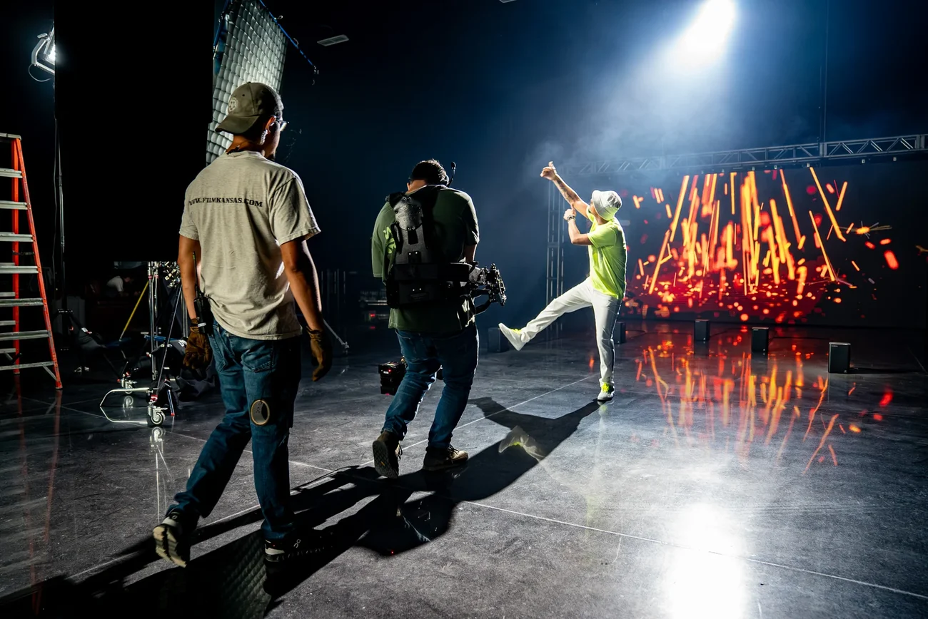 A colorfully lit live set on the stage
